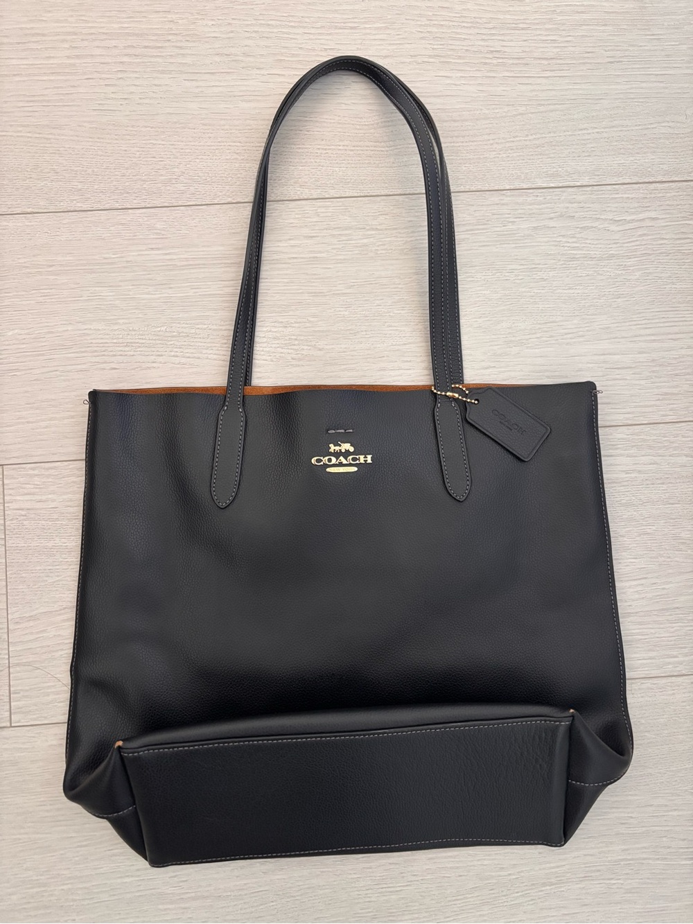 Coach Black Leather Tote with Gold Logo Accent